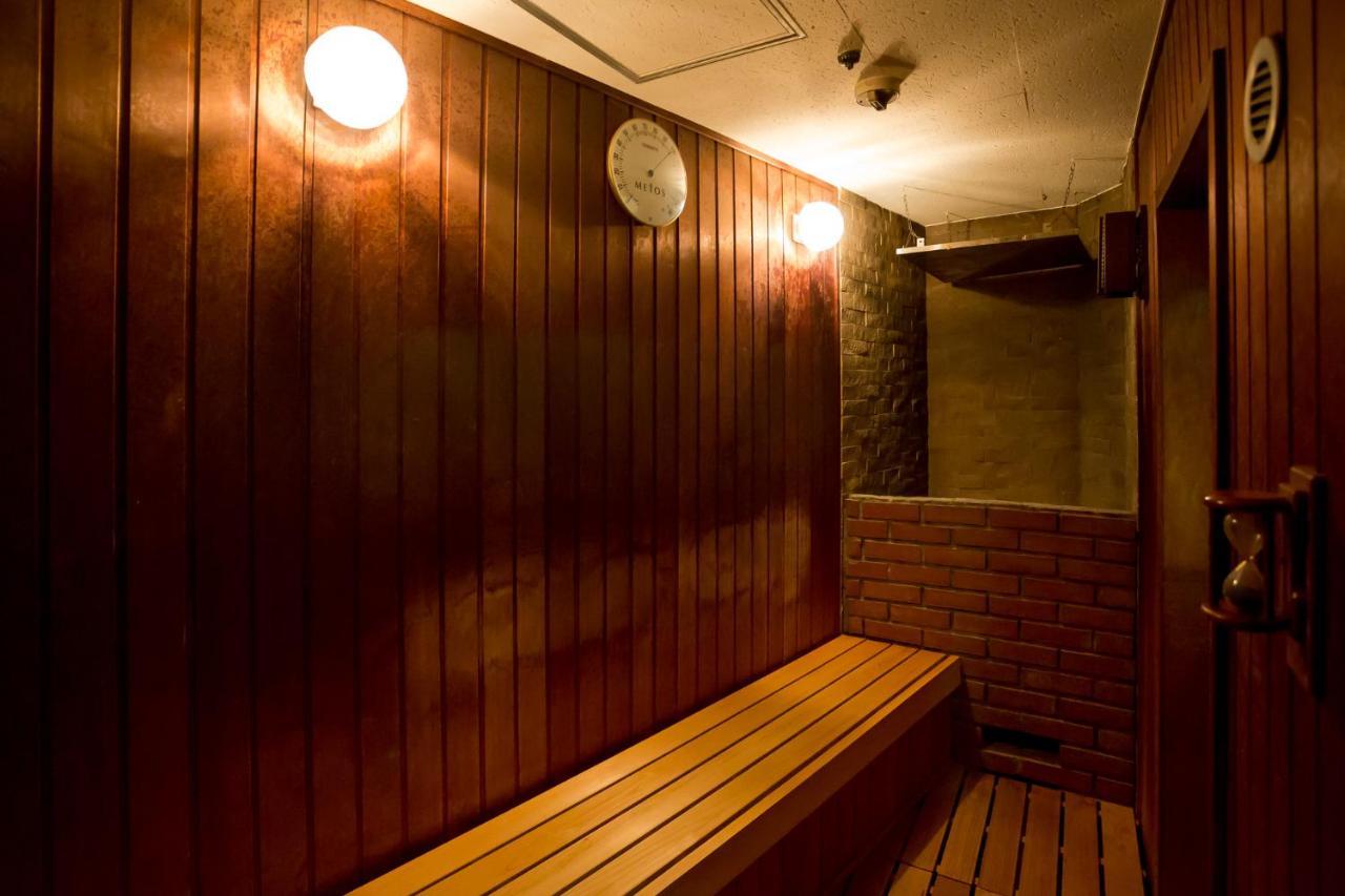 Отель Capsule Land Yushima Токио Экстерьер фото