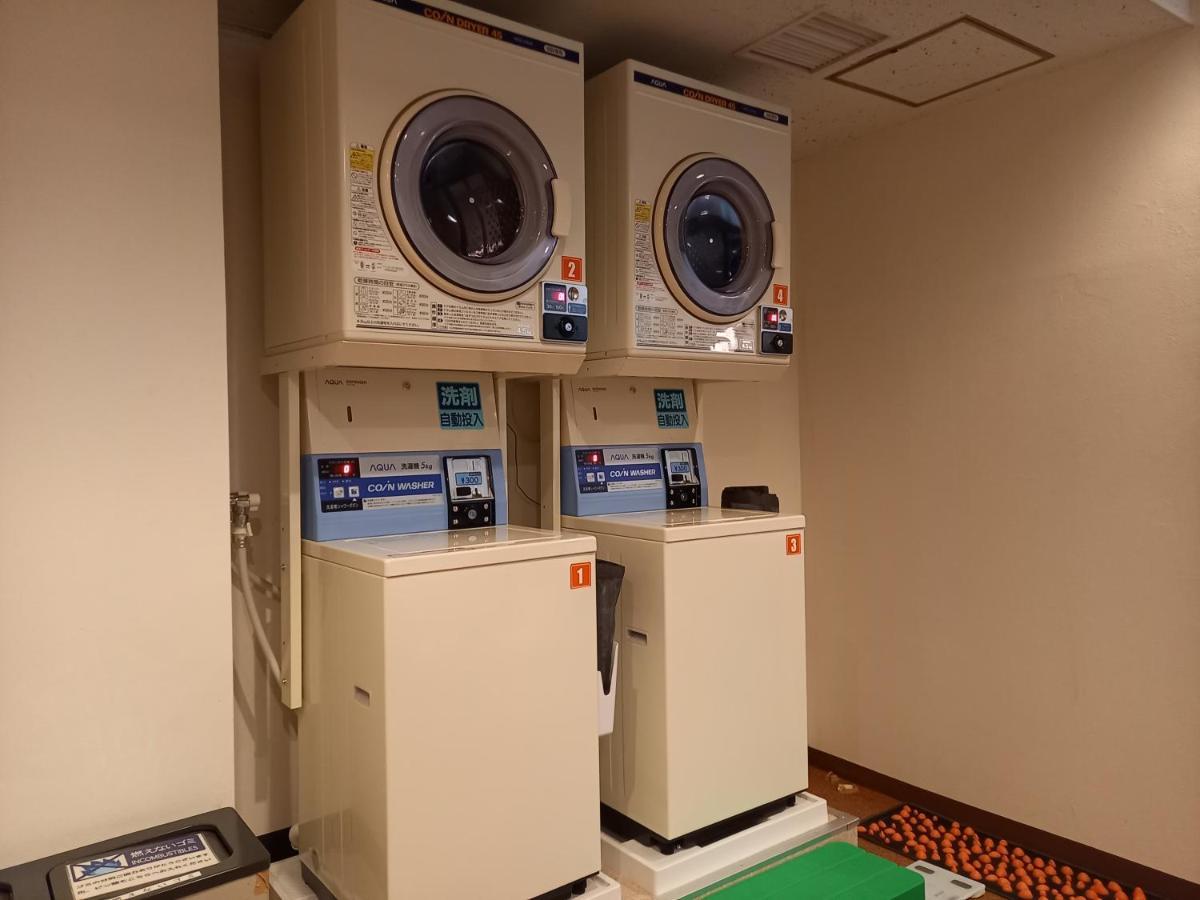Отель Capsule Land Yushima Токио Экстерьер фото