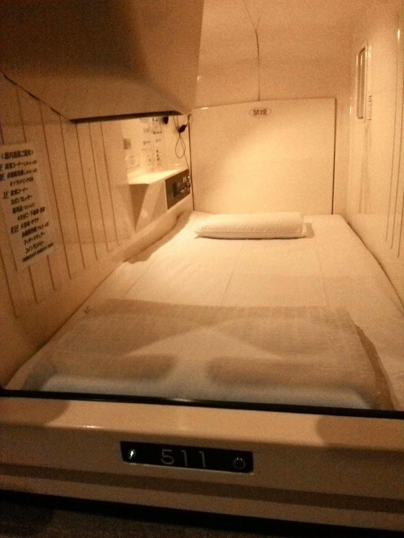 Отель Capsule Land Yushima Токио Экстерьер фото